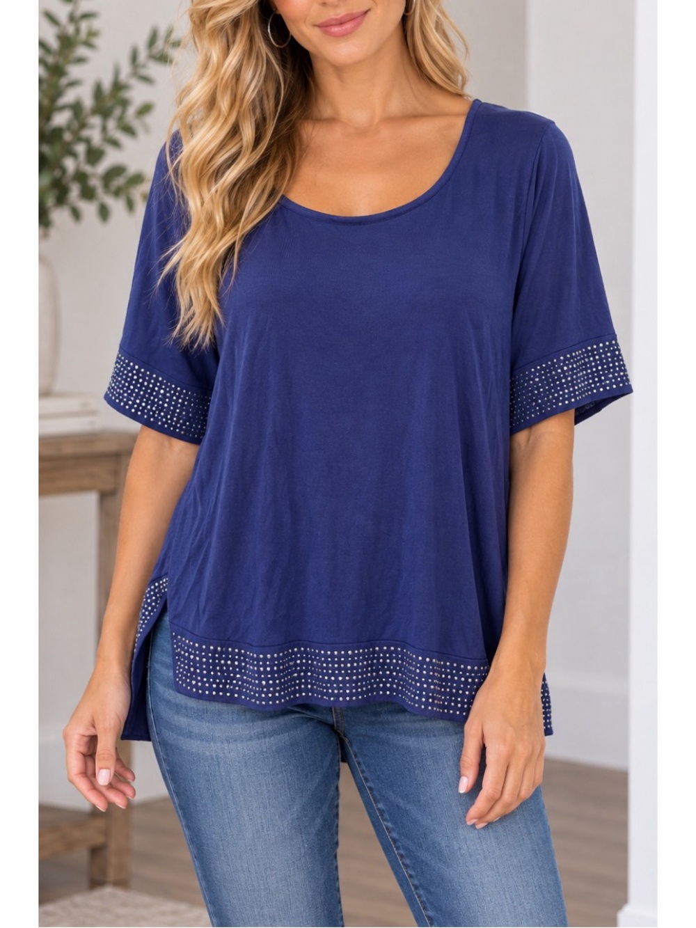 Rose & Olive navy blue top features rounded scoop neckline and short sleeves